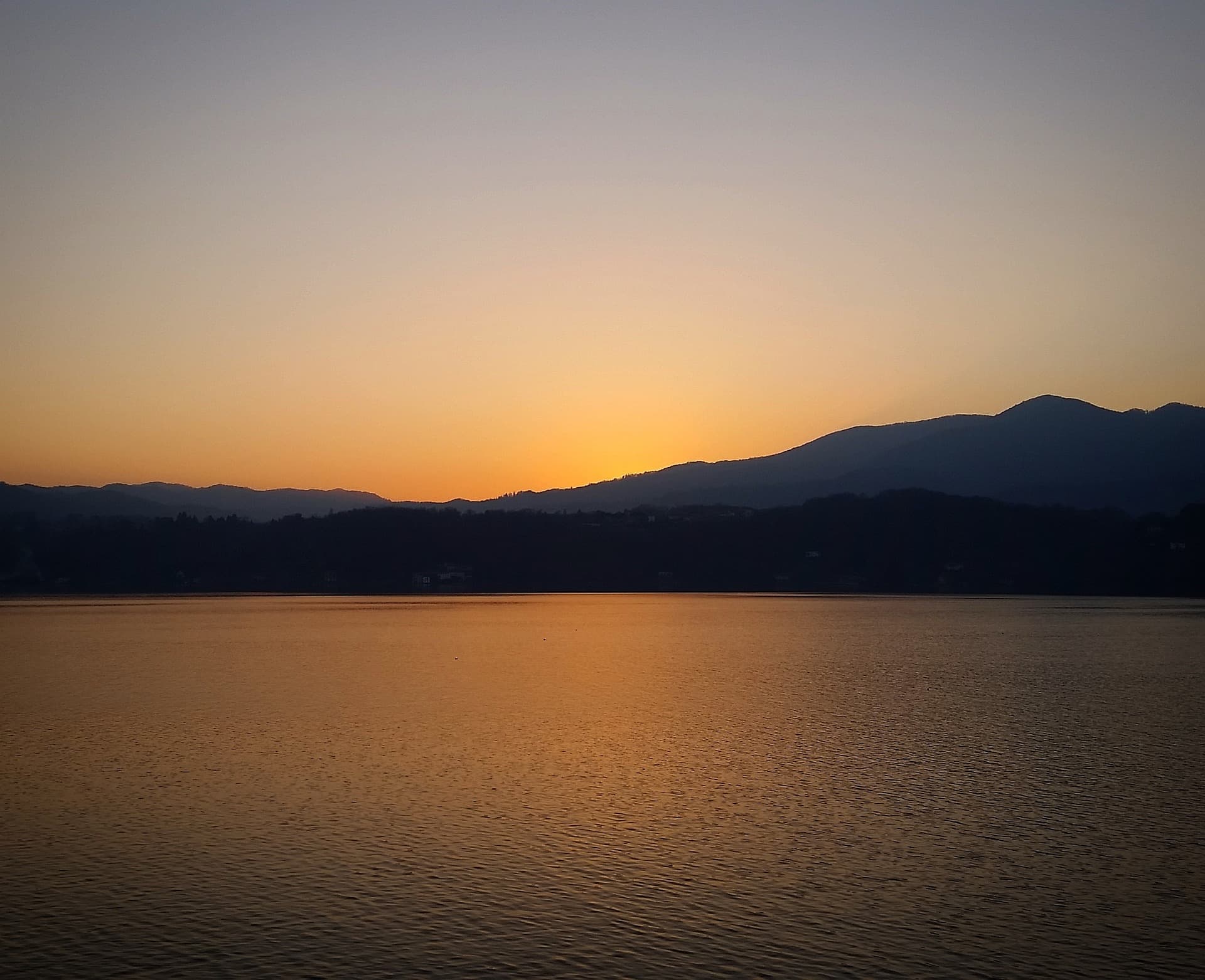 Warm evening light settling over Lake Maggiore